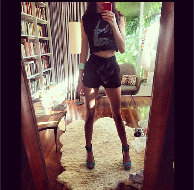 Oh really? Kendall and Kylie Jenner tweet super fat photos of themselves.