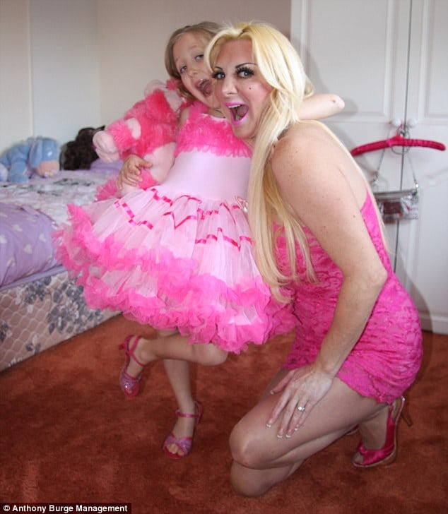 The Human barbie with her daughter