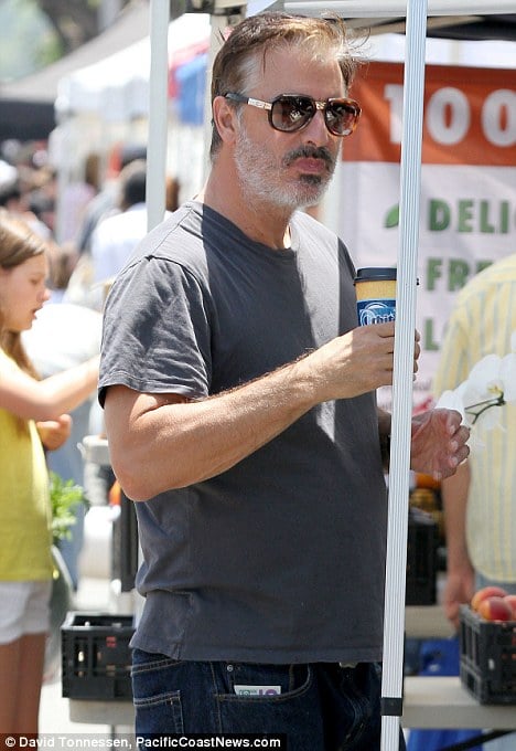 Chris Noth now unrecognizable with grey hair and pot belly.