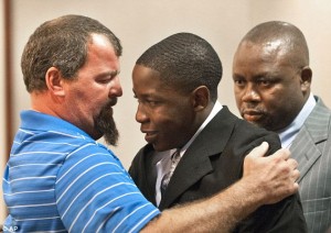 Father of car crash victim hugs driver who killed his 17 year old son.