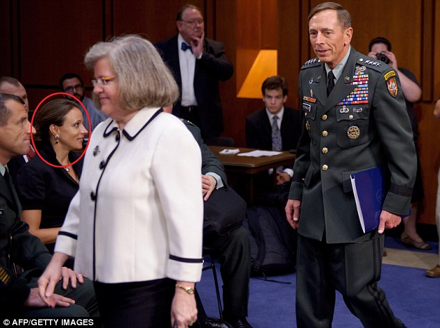 Paula Broadwell appears to be all love eyes for David Petraeus with Holly Petraeus in the foreground.
