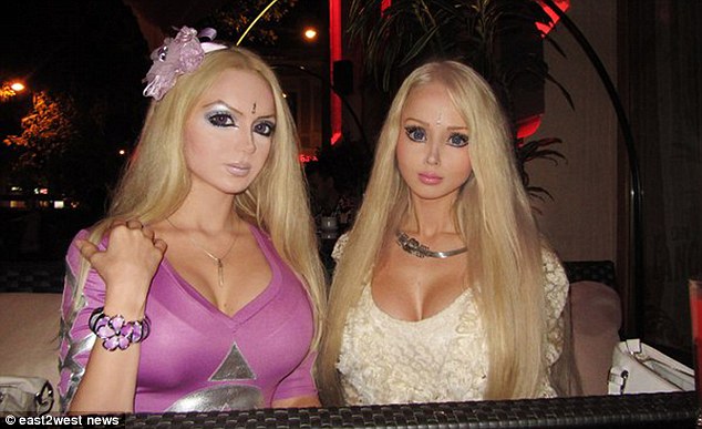Living Barbie doll Valeria Lukyanova meets her twin double, Dominica. 