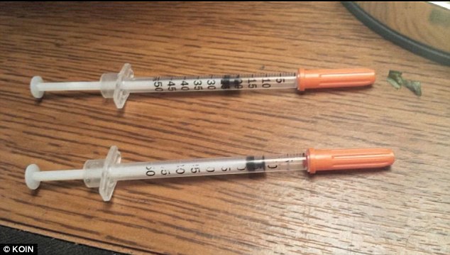 Son pricks his finger on used syringe found in Walmart sweatshirt