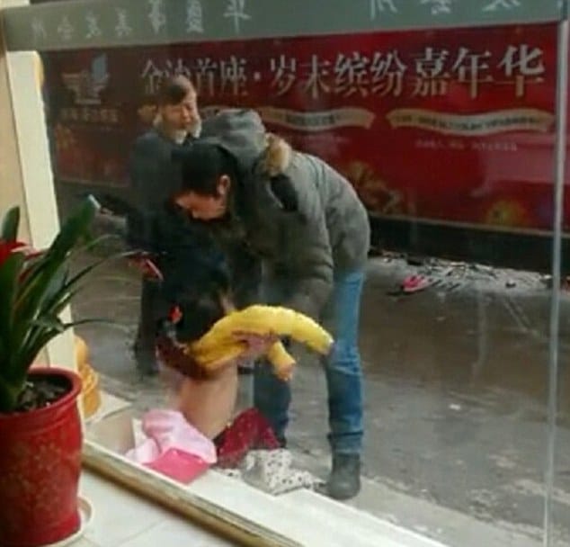 Chinese father stripping and dragging daughter