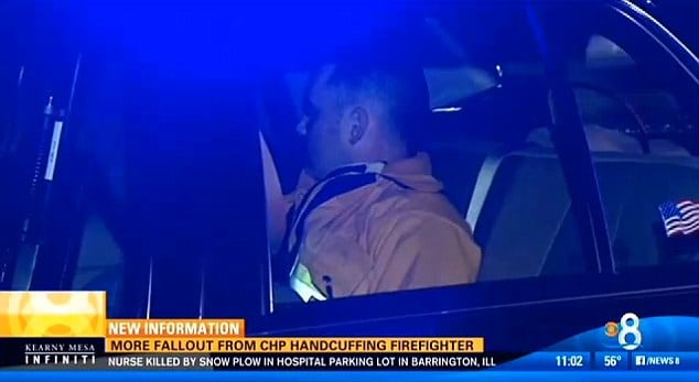 firefighter arrested by cop