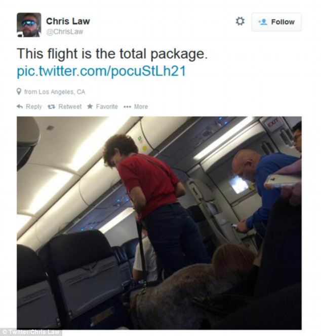 US Airways flight 598 emergency lands after service dog poops