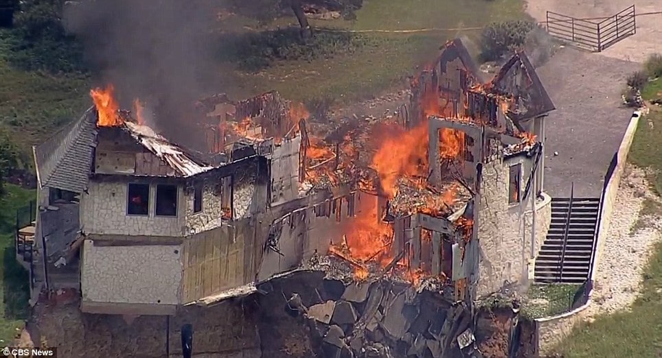 Mansion dangling off cliff