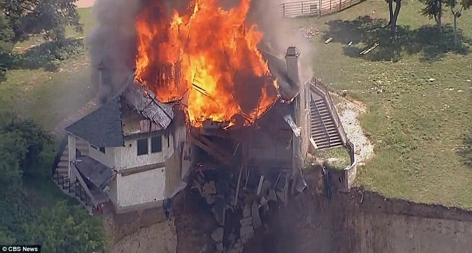 Mansion dangling off cliff