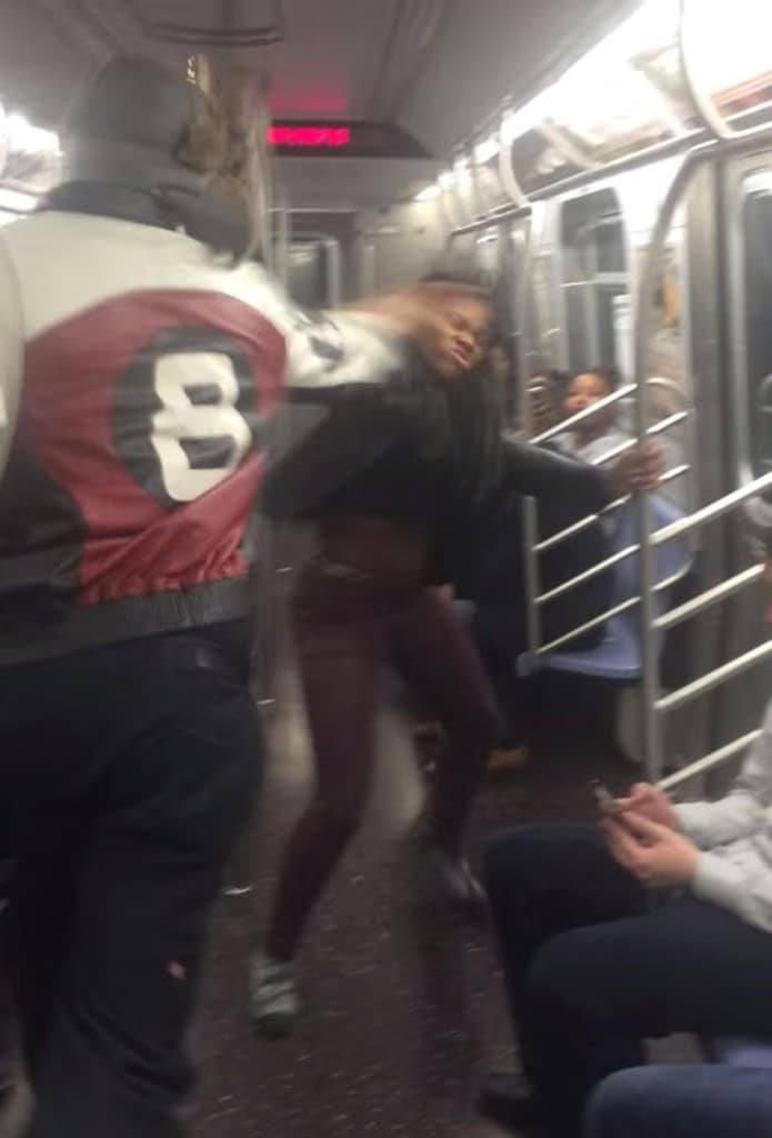  Man smacks the soul out of girl on the NY Subway