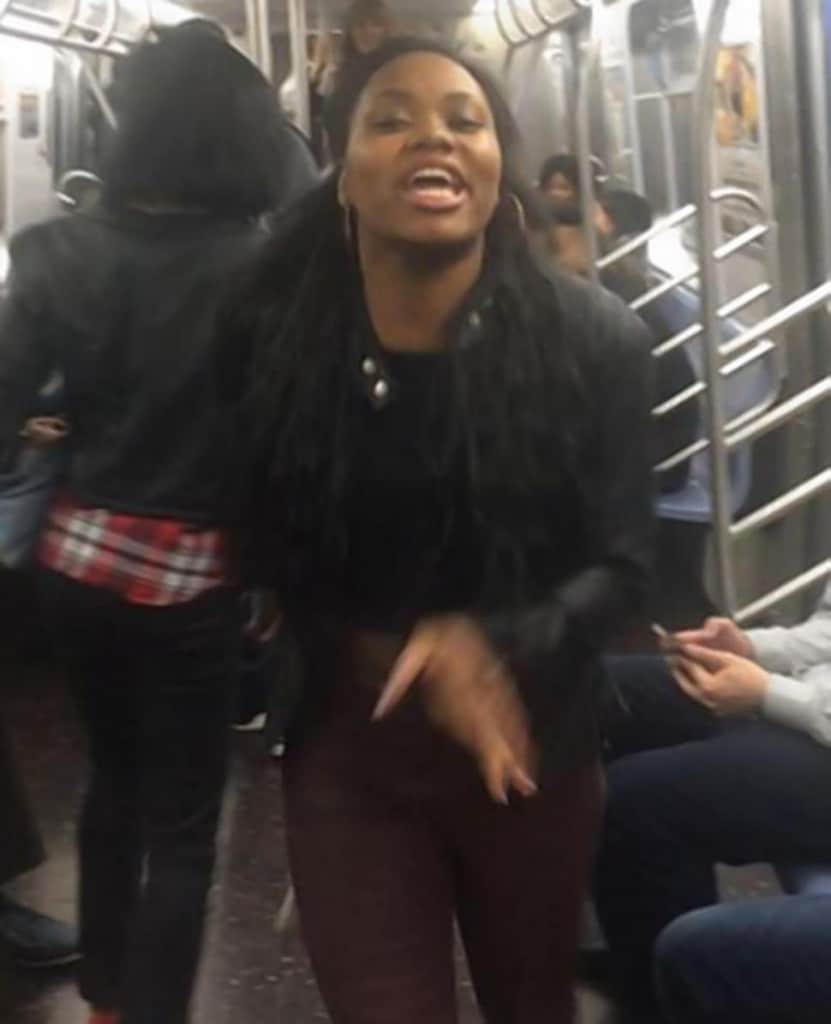  Man smacks the soul out of girl on the NY Subway