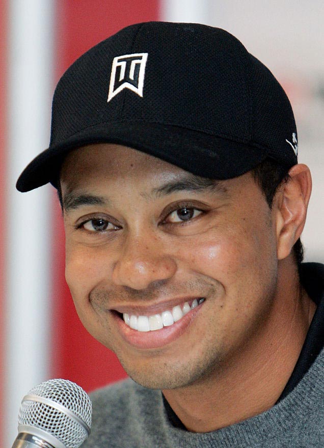 Tiger Woods without his fake front tooth