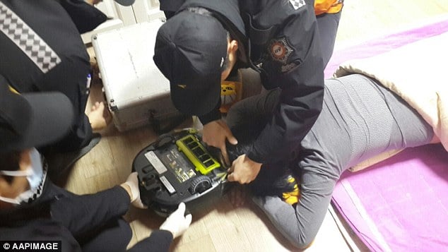 South Korean woman robot vacuum cleaner 