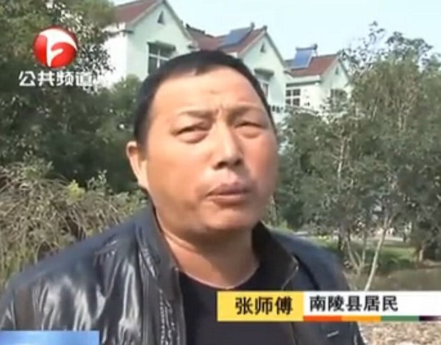 Chinese driver ignores injured pedestrian