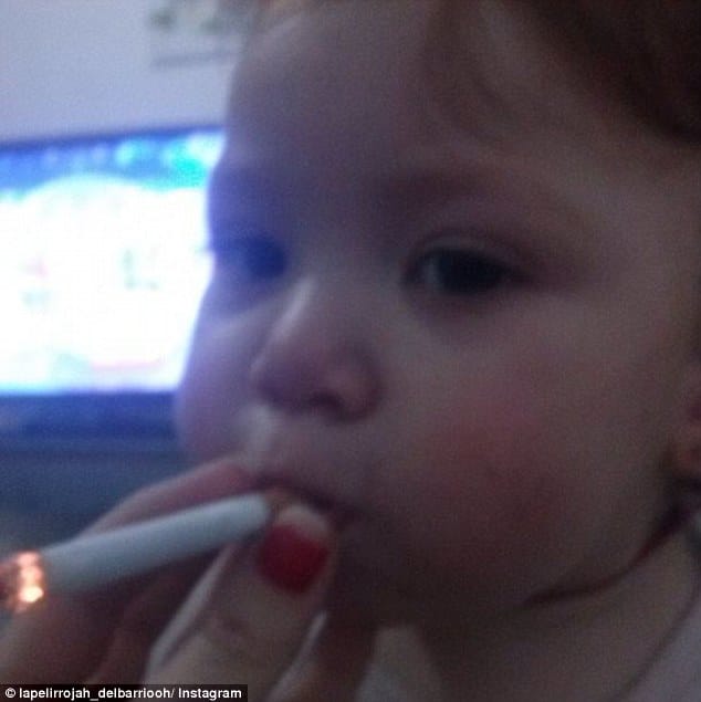 Spanish woman posts picture of baby smoking cigarette