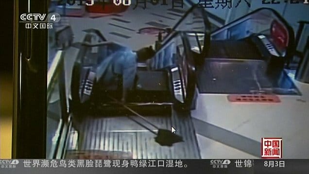 Shanghai shopping mall cleaner leg ripped off escalator