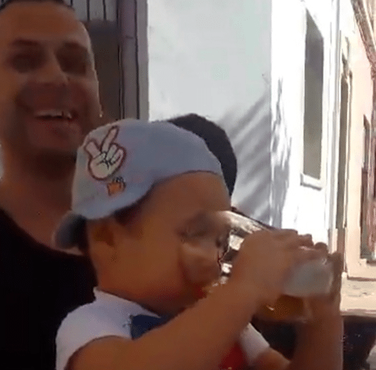 Romanian toddler forced to smoke and drink alcohol