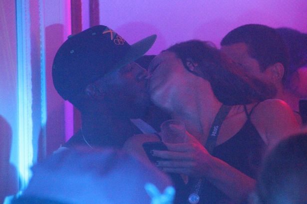 Usain Bolt kissing