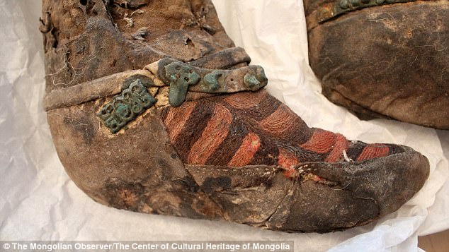 Mongolian mummy wearing Adidas boots