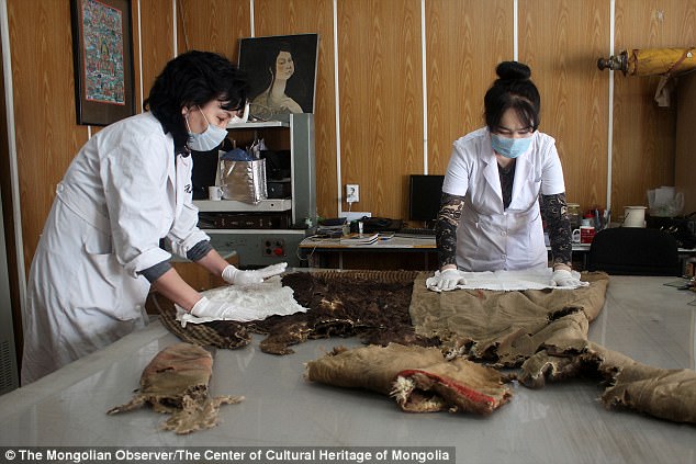 Mongolian mummy wearing Adidas boots