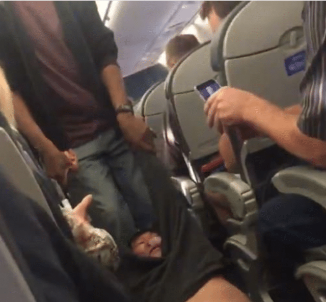 Blame United Airlines Doctor Dragged Off Kicking Screaming After Overbooked Flight