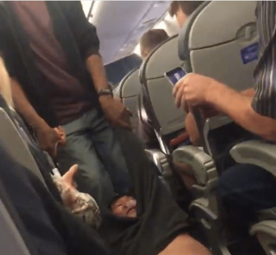 United Airlines drags off passenger overbooked flight