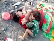 Photos: Crying Indian toddler baby found drinking milk from dead mother Crying Indian toddler found drinking milk from dead mother