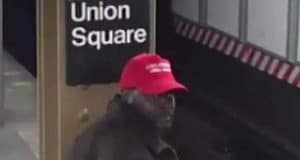 Black man wearing Make America Great Again hat