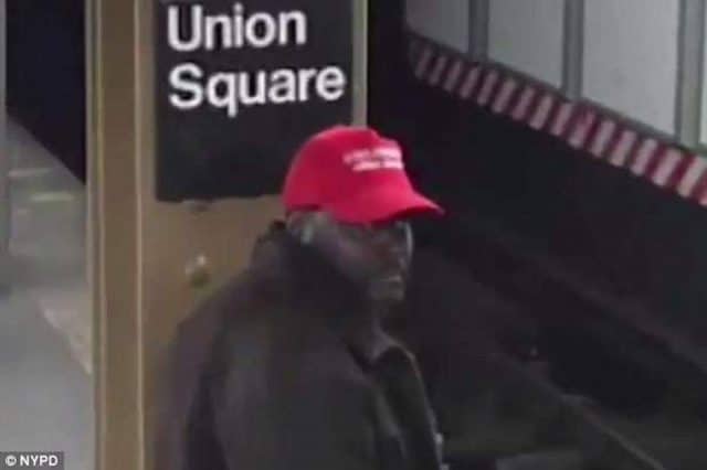 Black man wearing Make America Great Again hat