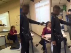 French student points gun at teachers head