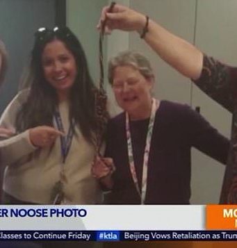 Palmdale teachers pose smiling with noose