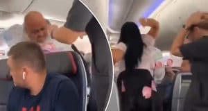 American Airlines passenger throws laptop at boyfriend