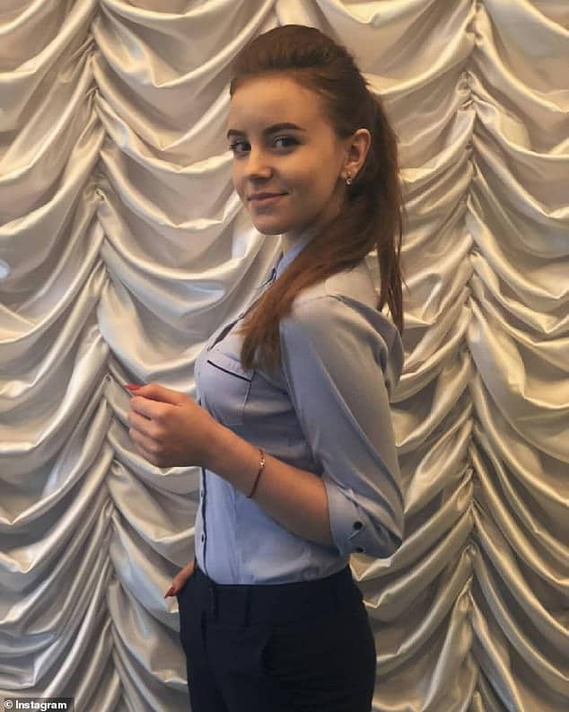 Ukraine teen girl posing for selfie loses half face