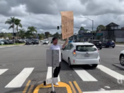 California hero: Encinitas local starts thriving street corner toilet paper exchange Johnny Blue Encinitas toilet paper