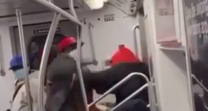 subway rider pummels homeless Asian bystander