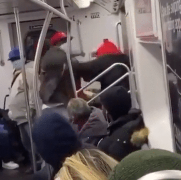 subway rider pummels homeless Asian bystander 