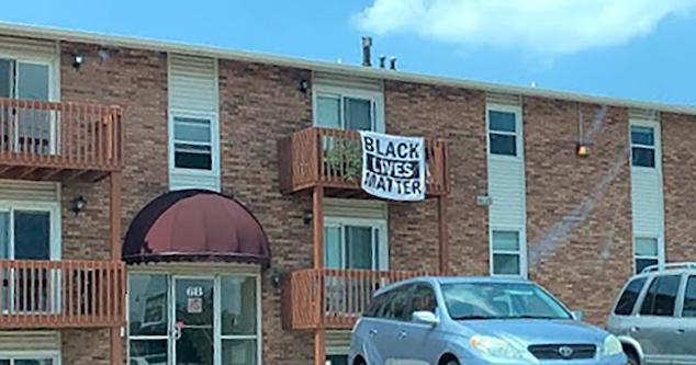 BLM flag Bloomington apartment eviction