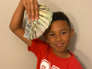 Indiana boy, 9, finds $5K cleaning out family SUV used car, gets surprise reward Indiana five year old boy finds $5,000 cleaning car