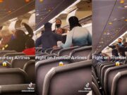 Brawl breaks out on Frontier Airlines after white man punches black man Frontier Airlines brawl white man black man