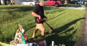 Brian Laundrie father mows lawn