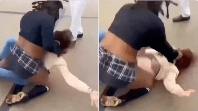 Maurnice DeClue Hazelwood East High School student beats female student Kailee concrete ground