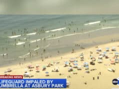 Female lifeguard impaled by 6ft beach umbrella at Jersey shore after falling of lifeguard chair at Asbury Park.