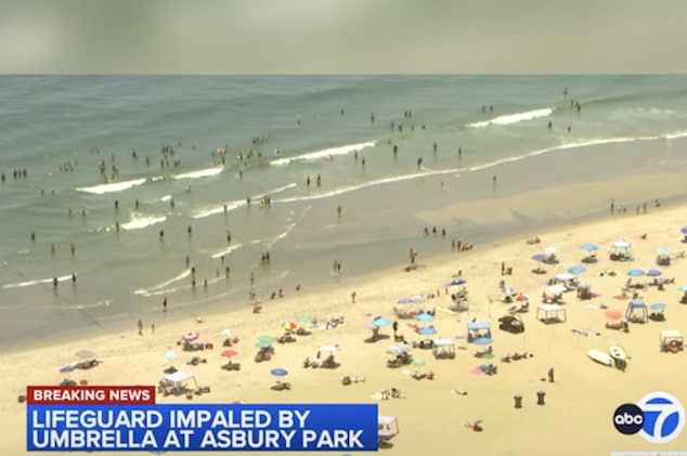 Female lifeguard impaled by 6ft beach umbrella at Jersey shore after falling of lifeguard chair at Asbury Park.