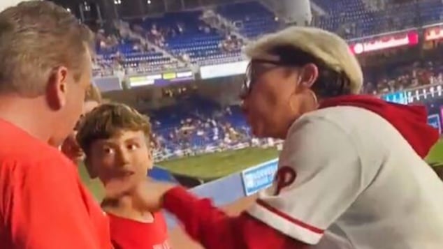 Drew Feltwell, Pennsylvania man explains why he handed home run ball to Phillies Karen, saying he wanted to set moral standard for his son.