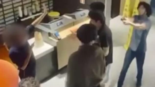 Yoan Soto Mcdonald's worker at drive-thru fires gun, striking customer in the neck after 2 men threaten violence over long wait time.