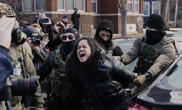 Minneapolis, Minnesota woman dragged from car by ICE agents during demonstrations.